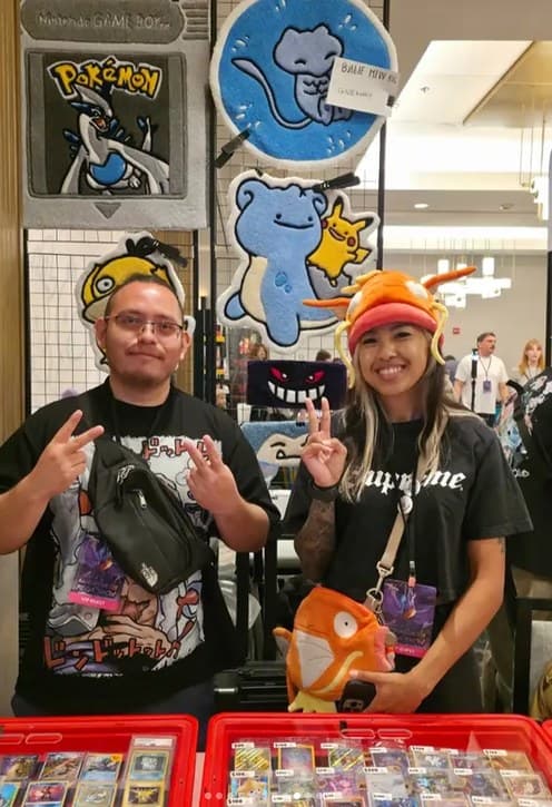 Two vendors in their booth